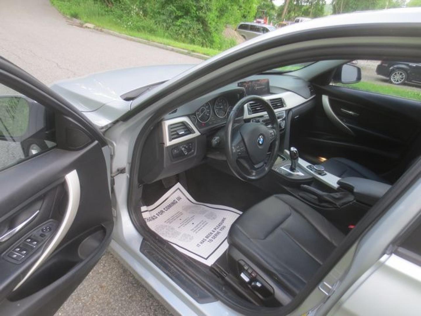 2016 Black /Black BMW 3-Series (WBA8E5G59GN) with an 2.0l 4cyl Turbo engine, Automatic transmission, located at 270 US Route 6, Mahopac, NY, 10541, (845) 621-0895, 41.349022, -73.755280 - Photo#6